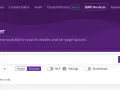 Narzędzie SERP Analyzer od Surfer SEO analizuje frazę "audyt seo" dla Polski, pokazując wyniki desktopowe.